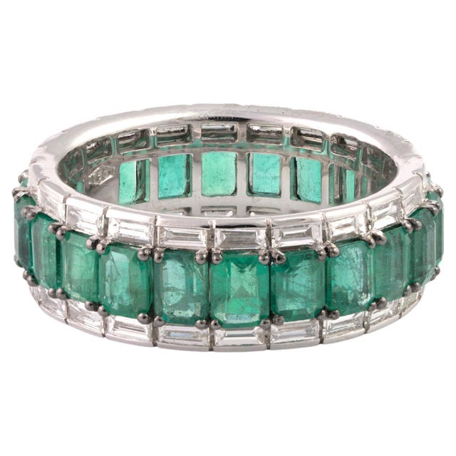 Emerald : 5.98 carats Diamonds : 1.56 carats Gold : 5.5 gms (18k) RING SIZE IS 9.5 THE SIZE CAN BE MADE AS PER YOUR SIZE...