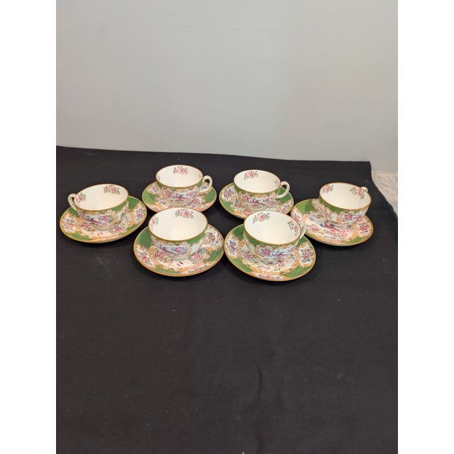 Lovely set of six Minton Cockatrice Green teacup and saucer pairs, showcasing the classic hand-painted chinoiserie design...