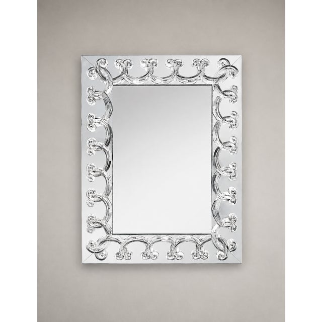 "Rinceaux" Mirror – Lalique Created in 1950 by Marc Lalique, the Rinceaux mirror is distinguished by an elegant frieze of...