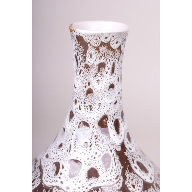 Maker: Ditmar-Urbach This elegant ceramic vase is a work of the renowned Czechoslovakian factory Ditmar-Urbach and dates...