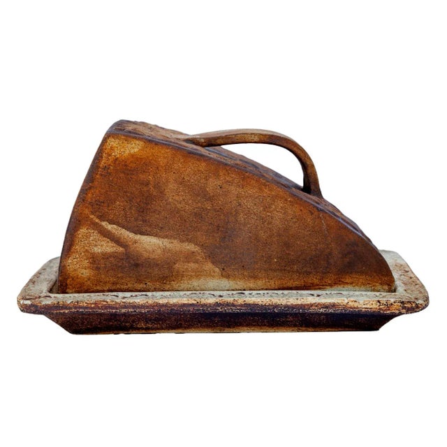 Vintage pottery lidded cheese keeper. Rustic design. Shaped like a large cheese wedge & hand-painted, functional as well...