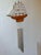Vintage nautical wind chimes with a wooden clipper ship with cloth sails, circa 1970's. Four melodic metal tubes in...