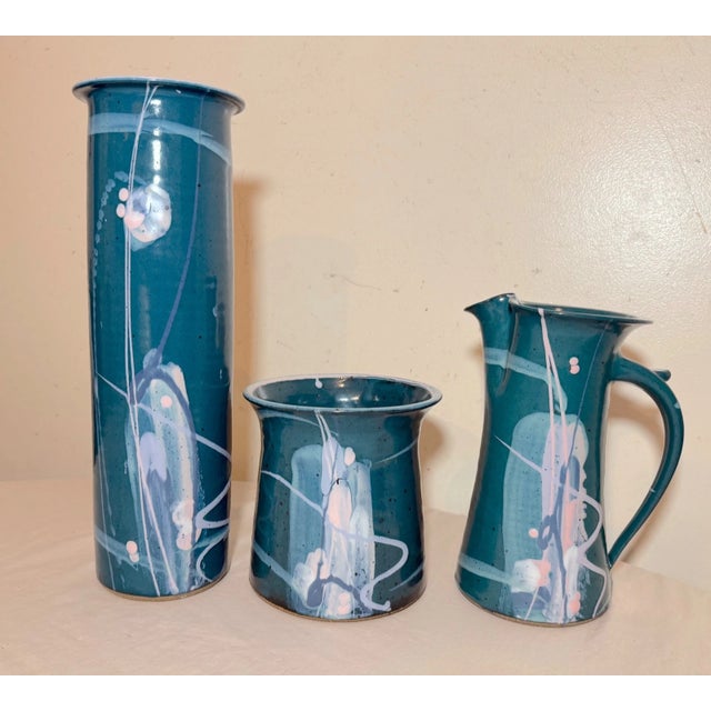 This 3 piece Mark Chamberlain cosmic deco handmade pottery lot is a stunning piece of contemporary art pottery crafted in...