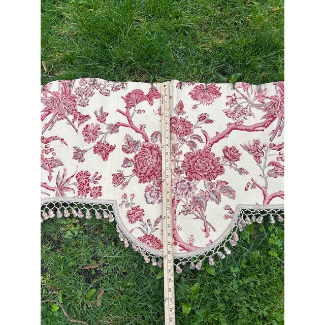 An early 20th century French floral valence accented with antique tassel fringe.