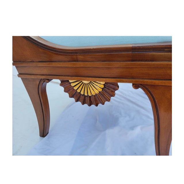 This is a set of ten regency style chairs attributed to Grosfeld House. The fabric is in very good condition, but the...