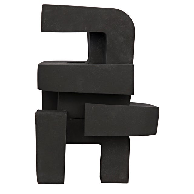 Fiber cement modern sculpture accessorizes rich geometric depth and height.