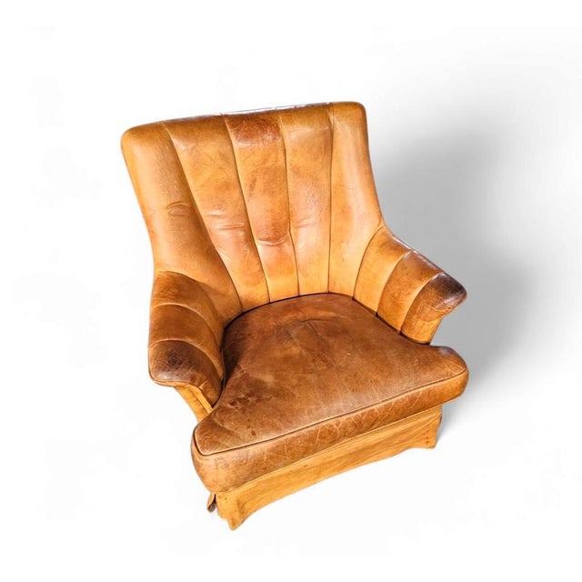 Sheep Leather club chair 1970s with magazine holder Leather club chair 1970s Height 90Width 85Depth 80Seat height 50 cm