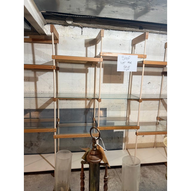 An extraordinary and exceptionally large vintage mid-century modern architectural shelving system, featuring an impressive...