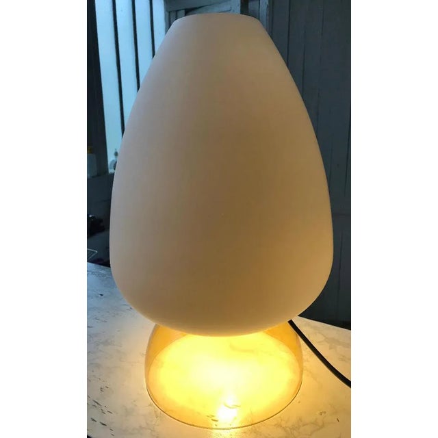 This is a beautiful Murano table lamp made circa 1980 , featuring the original label double lighting. European Plug (up to...