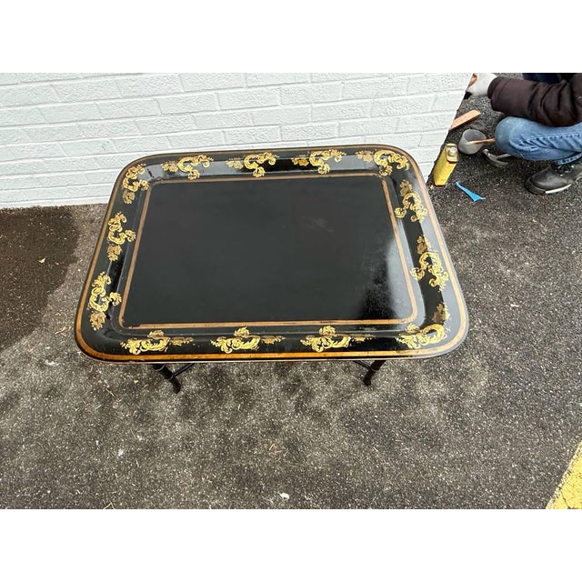 English Chinoiserie Paper Mache Tray Table or Coffee Table Black painted with gold gilt decor Tray top is removable...