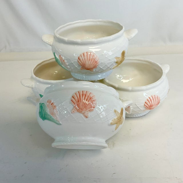 We have here a set of 4 ceramic soup bowls with side handles. They are Coastal Chic with pretty sea shells and starfish in...