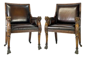 Pair of Theodore Alexander Regency Style Carved Lion & Hairy Paw Caster Armchairs in Brown Leather