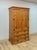 This handsome large vintage Mexican knotty pine armoire is a beautifully crafted and characterful rustic wardrobe find....