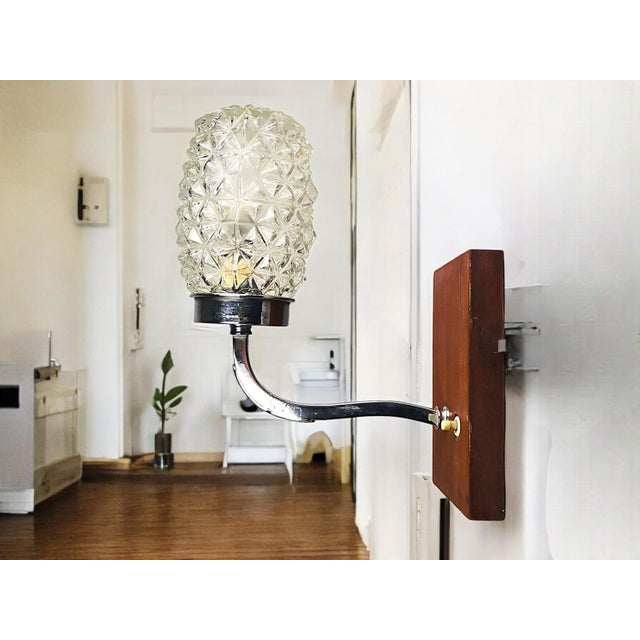 Discover the world of mediterranean mid century design with this captivating wall lamp. Designed and made in the 1950s-60s...