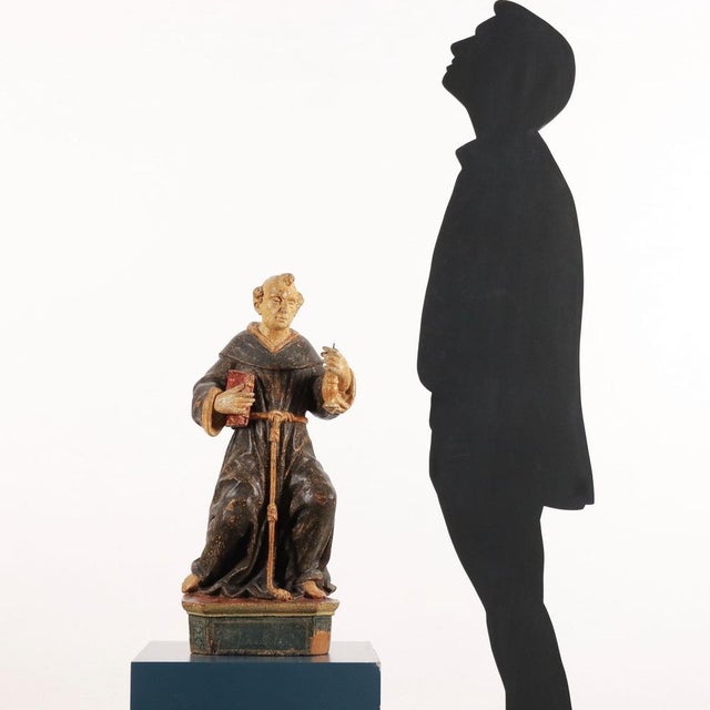 Sculpture in linden wood, painted in polychrome and depicting Saint Paschal Baylon (1540-1592) in adoration of the...