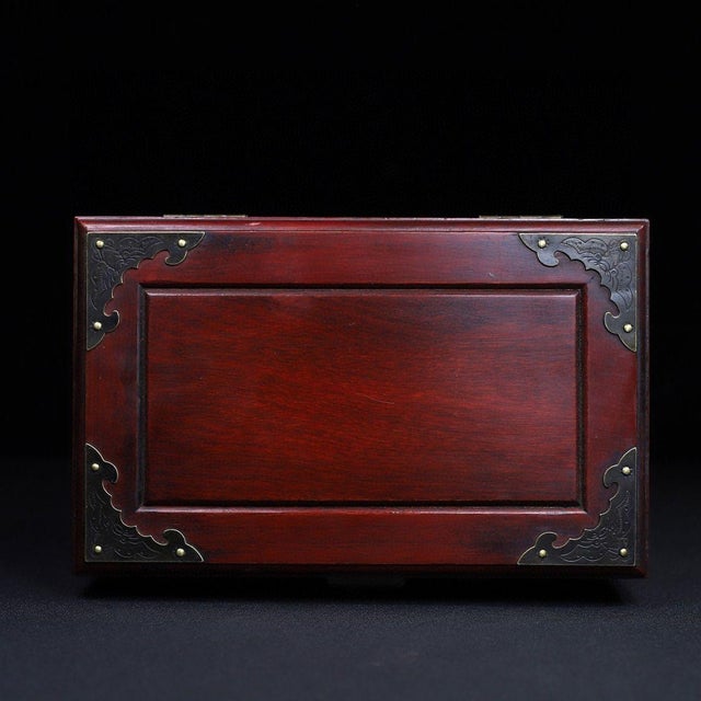 Add a touch of vintage Asian elegance to your vanity or desk with this exquisite Chinese redwood jewelry box. Crafted from...