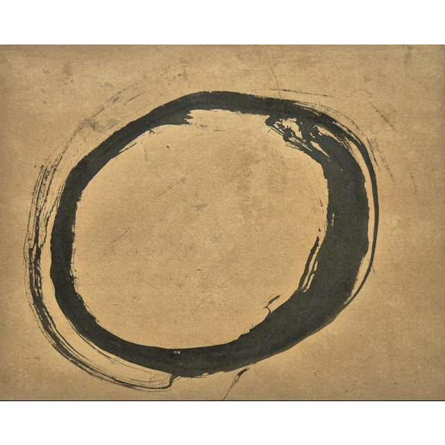 Antique Japanese Edo era calligraphy painting of the “Zen Mind” or ensō. In Zen art, an ensō is a circle hand-drawn in one...
