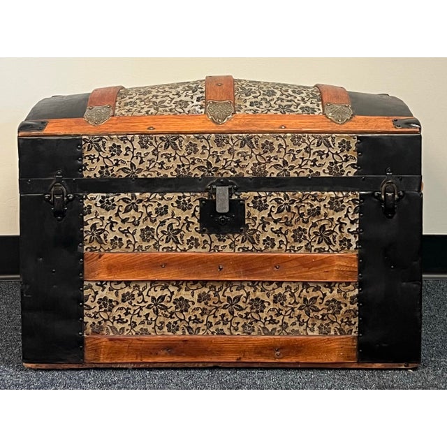 19th-century Victorian dome-top steamer trunk (circa 1880s–1890s) The trunk features its original well-preserved, ornate...