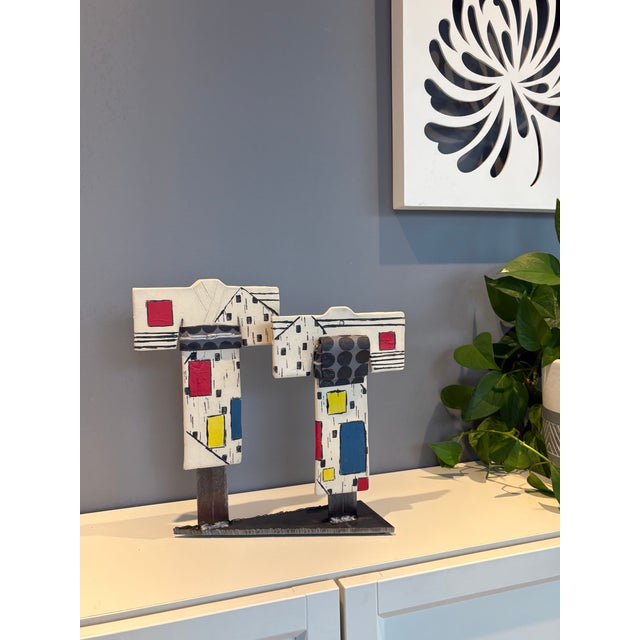 A one-of-a-kind composition of ceramic kimono sculptures informed by Japanese kimono tradition interpreted in clay and...