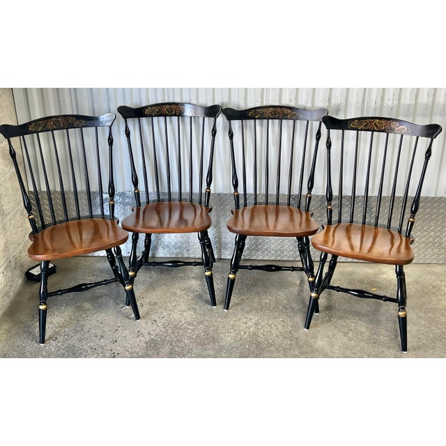 Set of 4 Fannack Windsor dining chairs by Hitchcock. Classic Hitchcock style with natural seats contrasting the black...