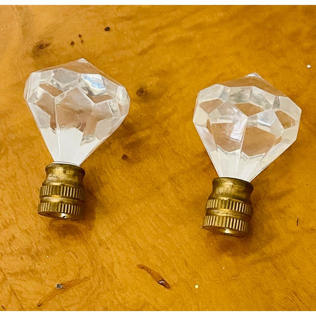 Vintage pair of lucite diamond cut lamp finials.