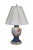 This stunning pair of antique table lamps features matching structures with asymmetrical hand-painted botanical artwork on...