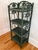 Pretty green wicker shelf with four tiers. Please see condition details noted. Height between shelves is 9.5". Most items...