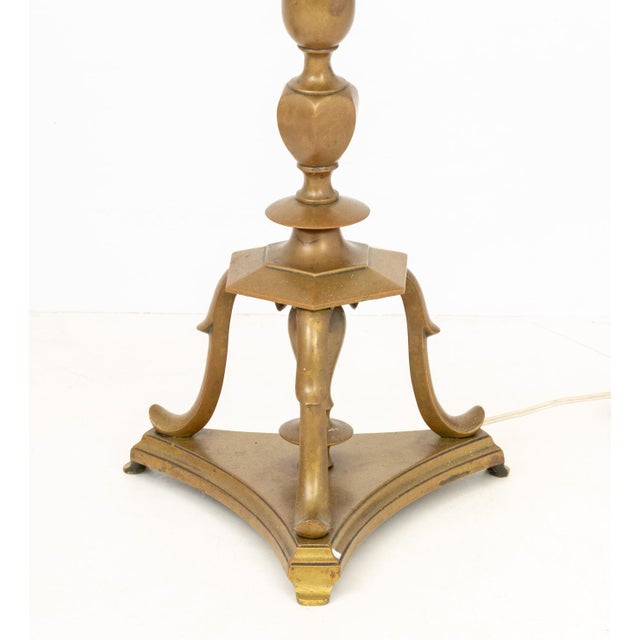 Pair of Modern Brass Tripod Floor Lamps, mid-20th century, each with two light sockets. 64" H x 12.5" W x 11" D....