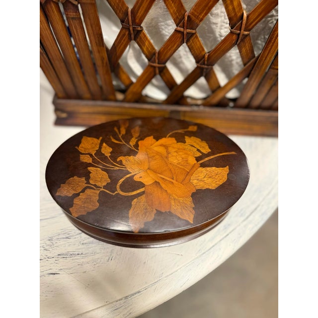 Exquisite, vintage piece of art oval shaped, hand carved and inlaid wood with floral motif decorative box. Made in Germany.