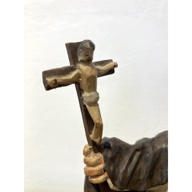 St. John Nepomuk, Bohemian, 1st half of the 19th century. Wooden carved figure of St. Nepomuk, known as the bridge saint....