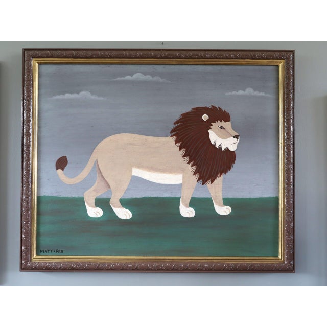 MAJESTIC LION Size: 17.7 x 21.7 inches (including frame) Oil on board A charming contemporary naïve style painting,...