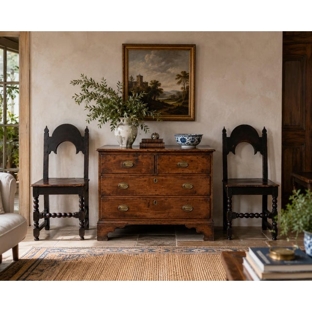 A wonderfully characterful pair of 17th century Yorkshire oak backstool chairs, retaining the wonderfully dark, mellow...