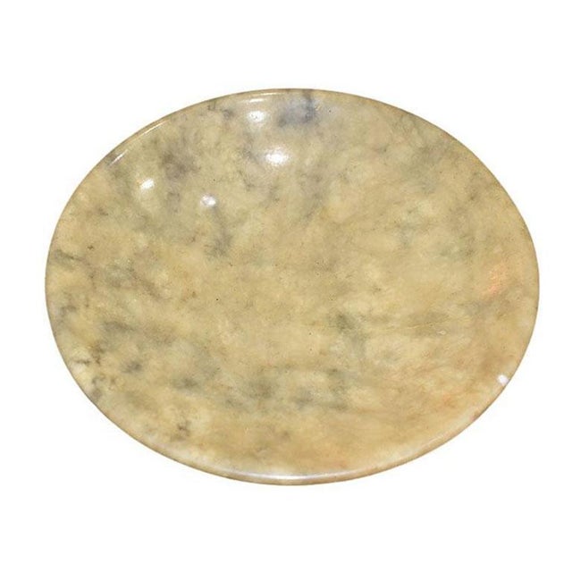 A beautiful carved Italian circular yellow stone fruit bowl that sits upon a round pedestal base. With gorgeous veining in...