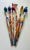 Six wooden paint brushes plus a vase / pot The largest brush is 26 1/4" tall The shortest brush is 24 1/2" The vase is 10"...