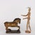 Lacquered papier-mâché horse. Adhesive label from the retailer under the base. This piece is attributed to the mentioned...