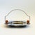 A vintage art decor chrome serving tray with a handle. Features spherical bakelite accents at the base of the handle and...