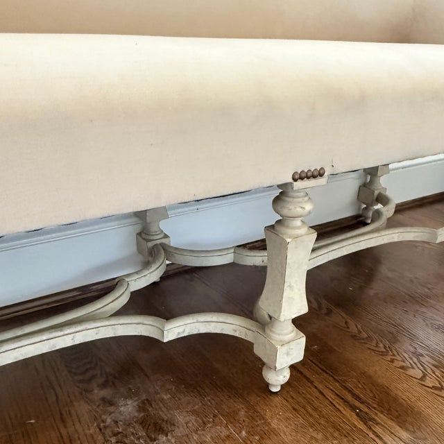 This sculptural bench is both baroque and modern suitable for most styles. Priced to allow for reupholstery. 62” x 20” x...
