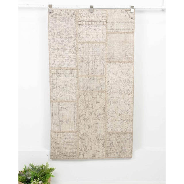 Vintage Turkish Hand-Knotted Patchwork rug is a semi-antique vintage runner rug. The '70s Eastern region of Anatolian's...