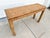 A shape with quiet confidence. This vintage rattan console features a tightly woven top, subtle waterfall edge, and...