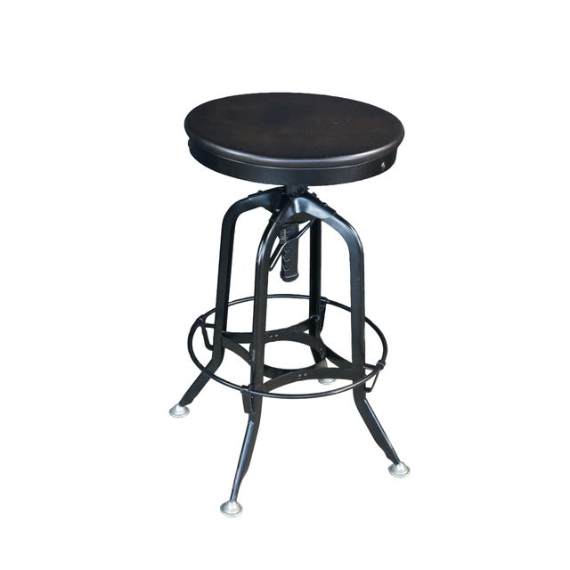 Restoration Hardware's reproduction of the classic vintage-inspired draftsman's chair pairs industrial styling with the...