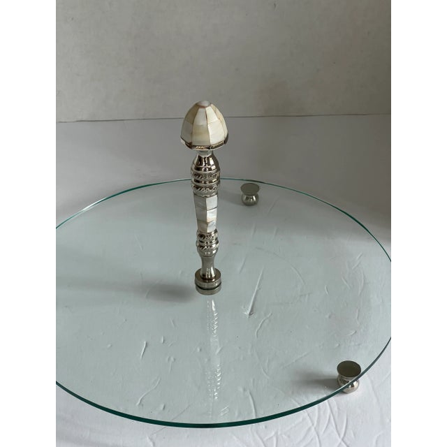 Glass and metal serving tray/plate with bone handle. A beautiful piece to serve appetizers, or desserts. Add this tray to...