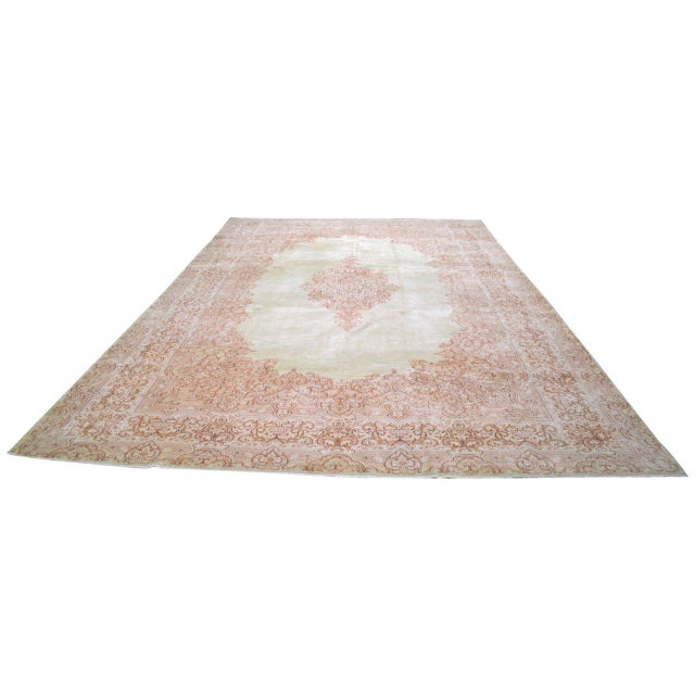 Hand-knotted with care using traditional rug-making techniques, this wool rug blends timeless craftsmanship with a modern...