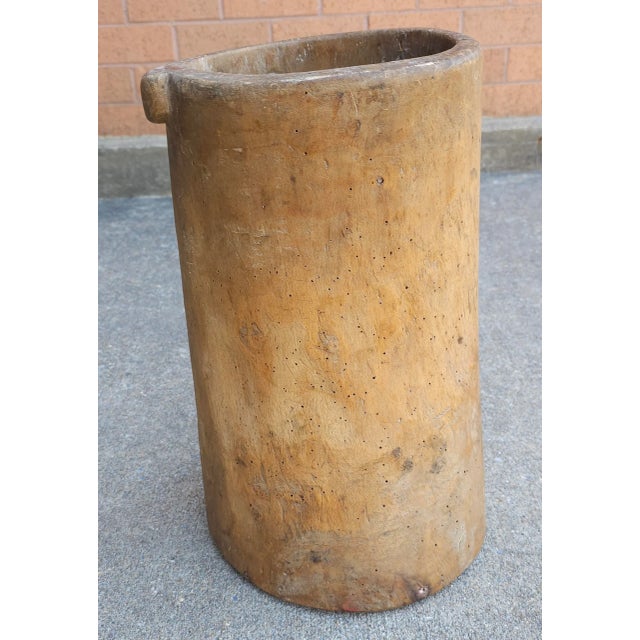 A Primitive American Handcrafted Wooden Umbrella Stand Measuring 9" in width, 8" in depth and standing 16.5". Nice Patina.