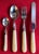 French stainless steel place settings with pearlized handles including 8 soup spoons, 8 tea spoons, 8 forks and 8 knives,...