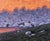 Paintbrush Divide captures a dramatic mountain landscape, where towering peaks bathed in warm hues contrast with cool,...