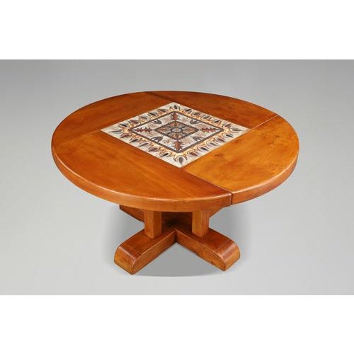 Mid-Century French Elm and Ceramic Dining Table by A. Picard, 1970s This striking Mid-Century dining table combines...
