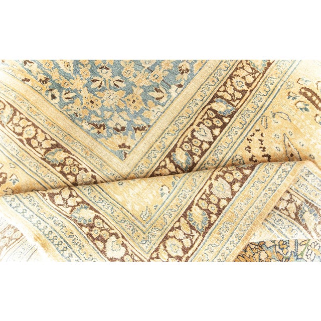 An extraordinary early 20th century Persian antique khorassan rug, the sage field with a luxurious Ardabil-inspired design...