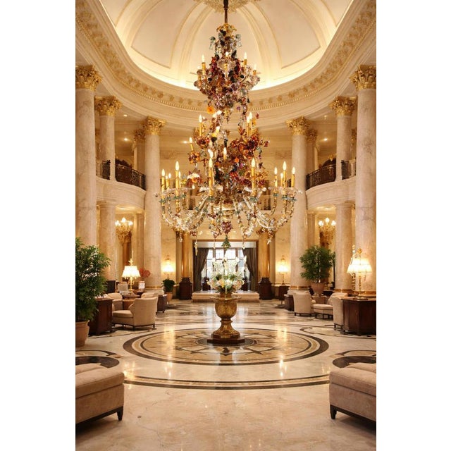 Sumptuous chandelier with 27 flames in very delicate Murano glass blown crystal color embellished with 24-carat gold...