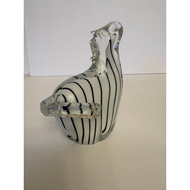 This heavy murano hand blown glass sculpture is just adorable in it's own right. The height of the zebra is 5", with the...