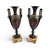 A pair of antique French Amphora-form vases in heavy spelter with dark patina and marble bases. Each vase features a...